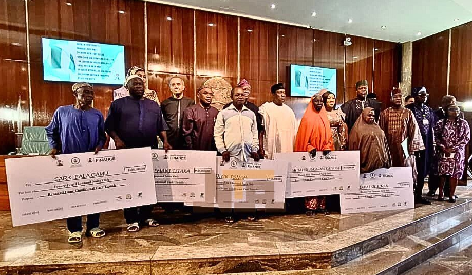 Beneficiaries and government representatives at the October 2023 launch of the programme targeting 15 million households. Credit: Daily Trust